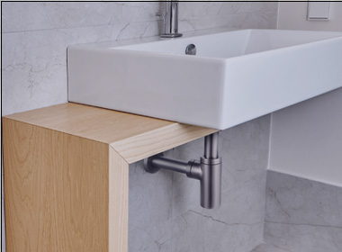 siphon de lavabo salle de bain apparent